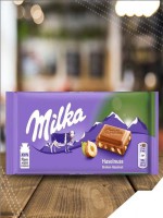 Milka Broken Hazelnut Chocolate Bar – Creamy & Crunchy European Treat - Best Price in Bangladesh | Shampoobd